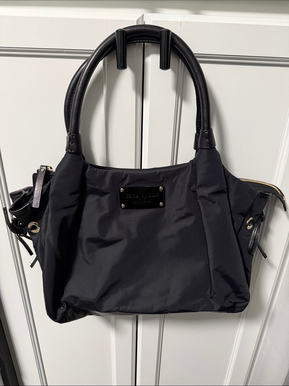 kate spade Black Nylon Shoulder Bag with Gold-Tone Plaque & Polka Dot Lining